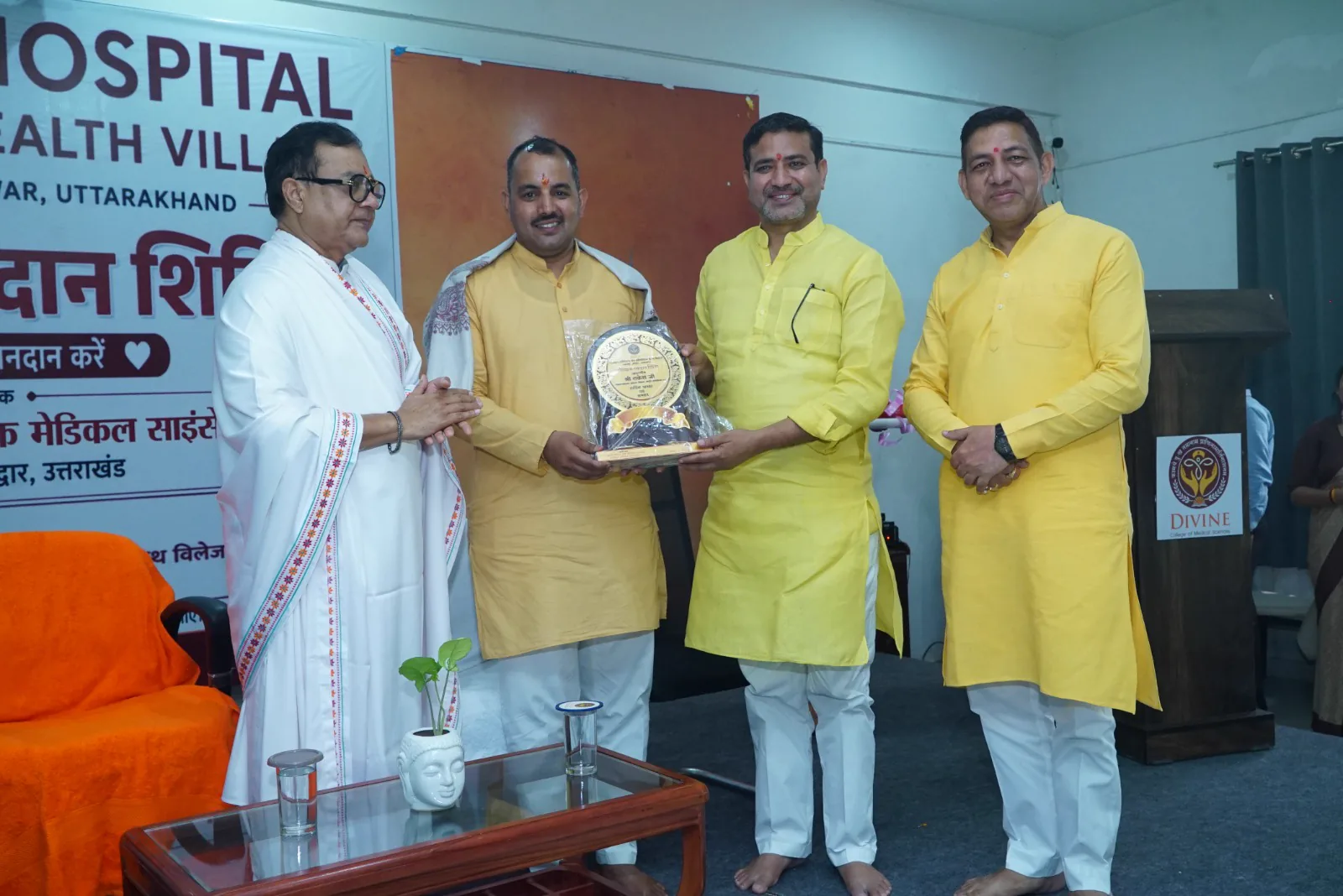 Felicitation with a memento at the Blood Donation Camp, Divine Hospital and Holistic Health Village, Haridwar